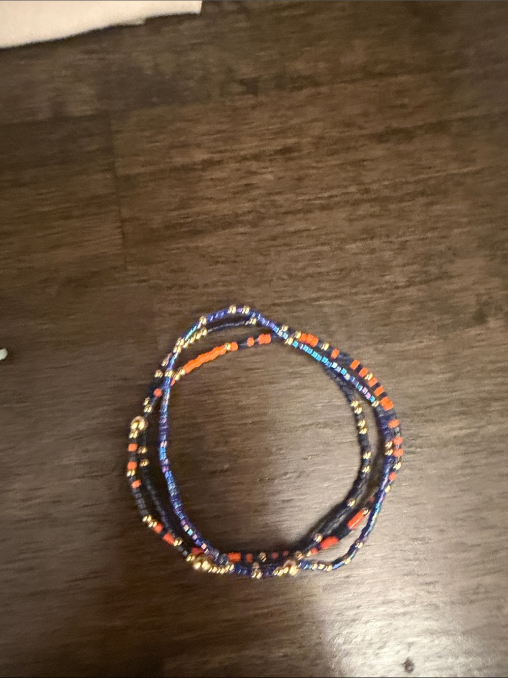 Multi-Strand Beaded Wrap Bracelet in Navy and Orange with Gold Accents